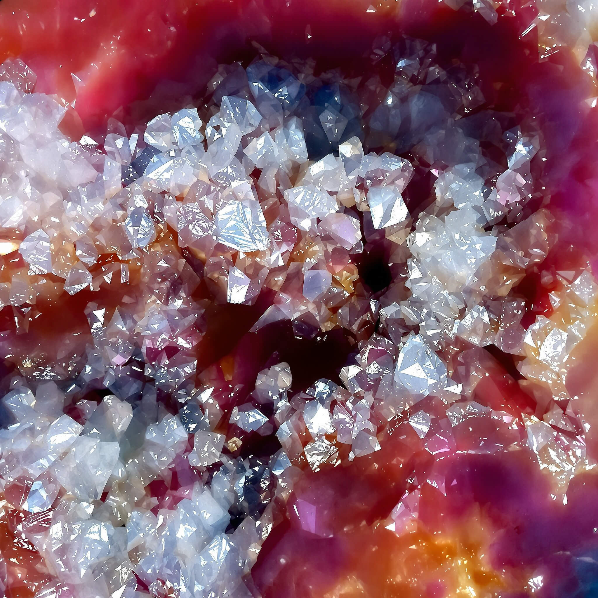 Flux 1.1 Pro Ultra macro shot of a sliced geode showing crystalline structure and rich color gradients