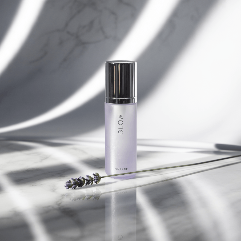 Ideogram v3 Balanced photorealistic product shot of a skincare bottle labeled 'GLOW' on a marble surface in soft light