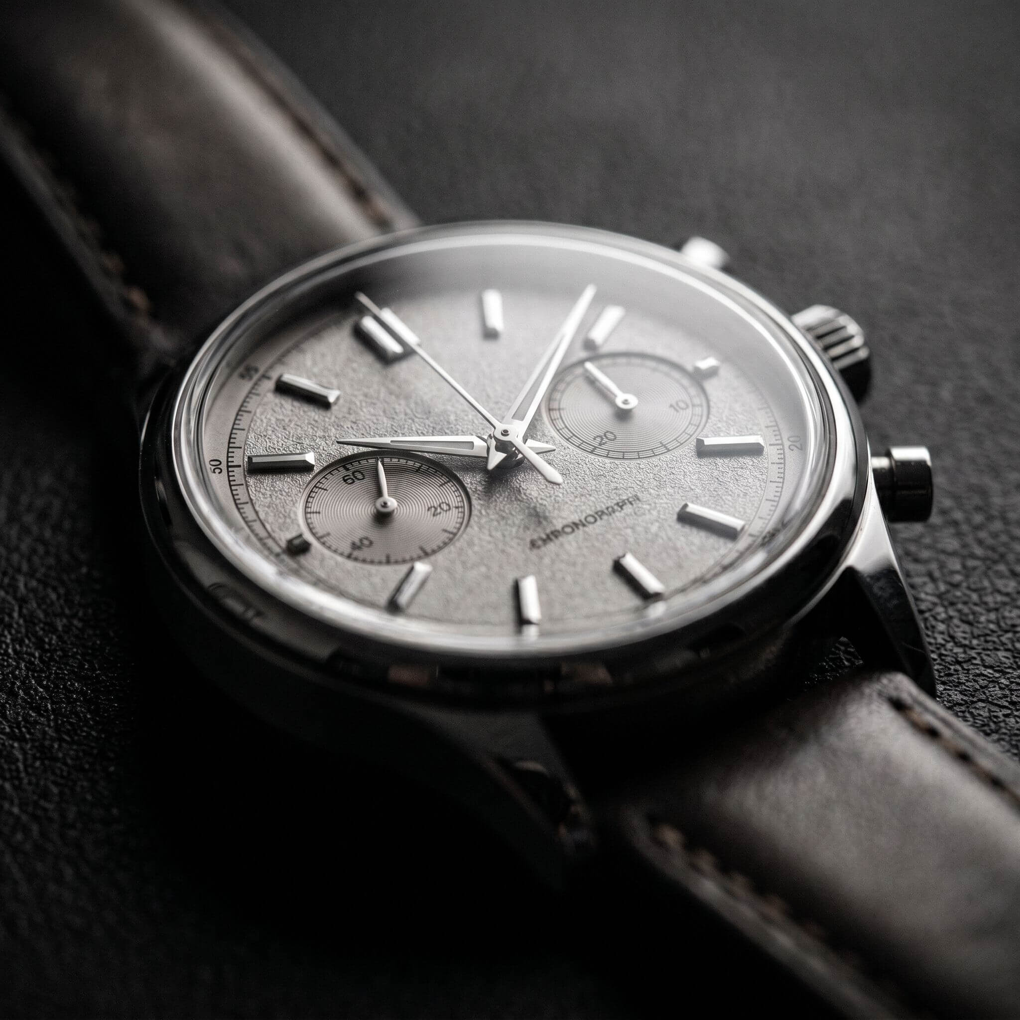 Nano Banana Pro 4K product hero shot of a wristwatch in studio lighting with a shallow depth of field on the dial